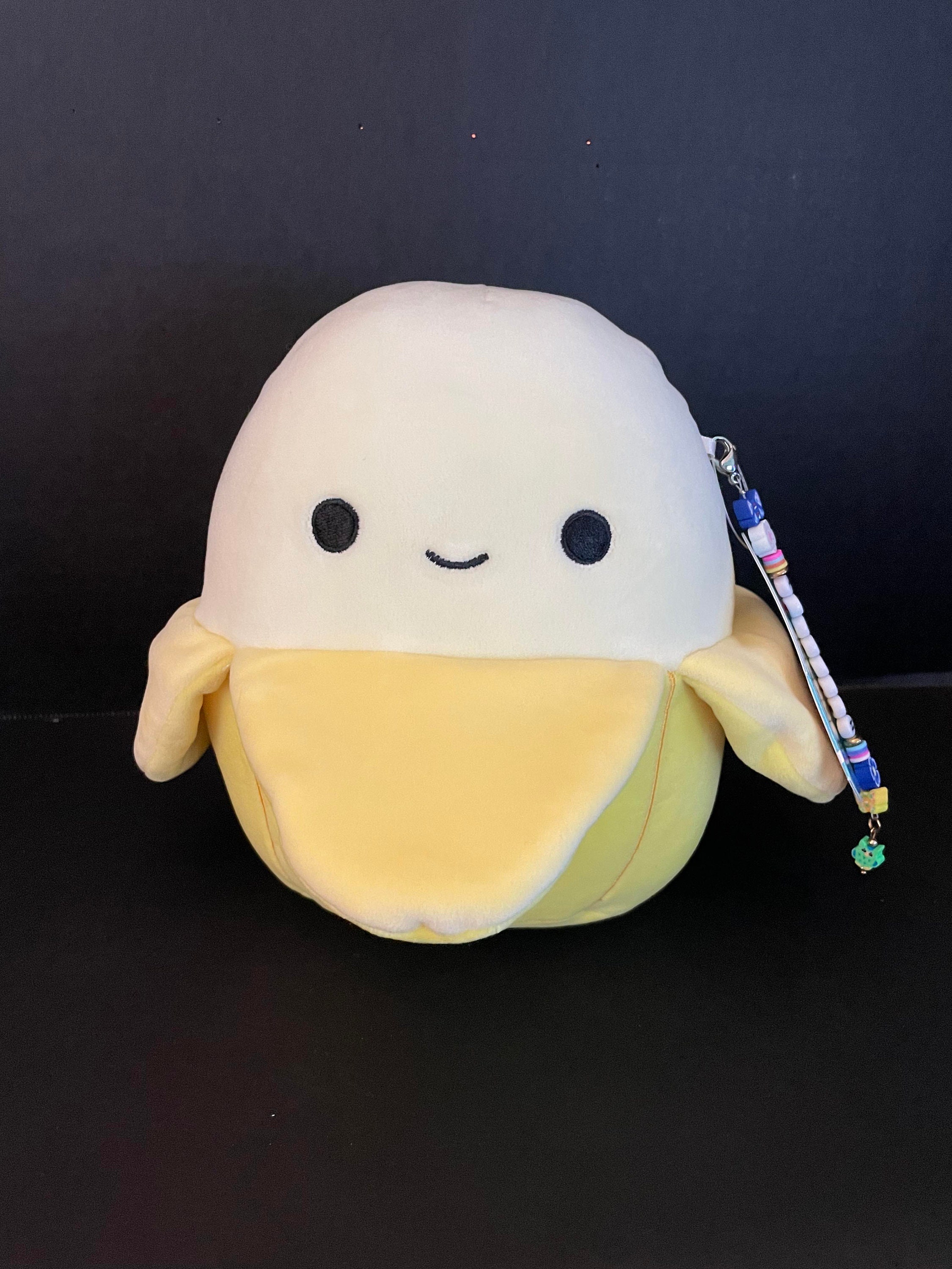 Stuffed monkey with banana in hand deals
