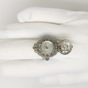 Vintage Marcasite silver tone (mirror dial) hidden ring watch by migi (Unsigned) works