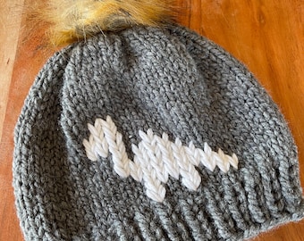 Hand knitted gray dinosaur beanie