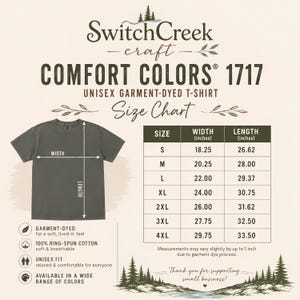 May include: A size chart for a SwitchCreek Comfort Colors 1717 garment-dyed t-shirt. The chart displays width and length measurements in inches for sizes S through 4XL, alongside a visual diagram of a dark grey t-shirt with arrows indicating measurement points.