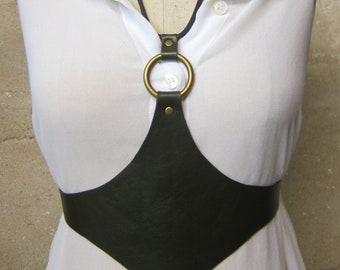 THE GUARDIAN is a unique, original, handcrafted, quality leather under-bust harness / belt / corset as worn by Chappel Roan band