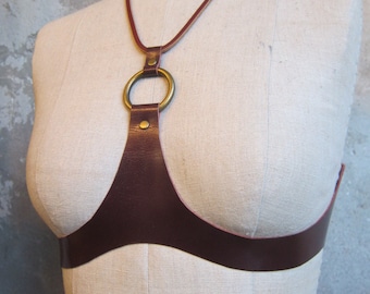 THE WARRIOR is a beautiful, unique, original, handcrafted, quality brown leather bra harness under bust.