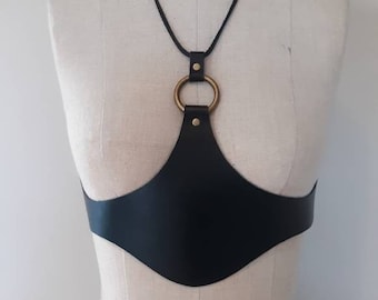 THE GUARDIAN is a beautiful, unique, original, handcrafted, quality leather under-bust harness / belt / corset as worn by Chappel Roan band