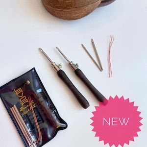 Ago per punciare il filo