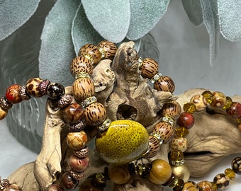 Decorative wood beads, gold accents, focal gemstone, stretch and stackable set of 4