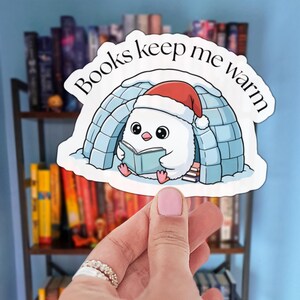 Books Keep Me Warm Festive Penguin with Santa Hat Reading in an Igloo Sticker