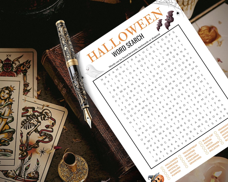 May include: A Halloween-themed image featuring a word search puzzle, a decorative pen, and tarot cards. The word search is titled "Halloween Word Search" and includes Halloween-related words. The pen has an ornate design. The tarot cards add a mystical element.