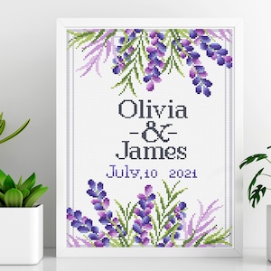 May include: A cross-stitch pattern featuring a lavender floral design with the names Olivia & James and the date July 10, 2021.