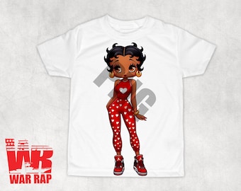 May include: White t-shirt featuring a cartoon image of a woman with black hair, wearing a red and white heart-patterned outfit and red trainers. The text "WR" is in the bottom left corner.