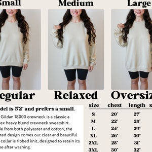 May include: A size chart for a unisex crewneck sweatshirt in beige. The chart shows the measurements for the chest, length, and sleeve in inches for sizes S, M, L, XL, 2XL, and 3XL. The text "Model is 5'2" and prefers a small." is also included.