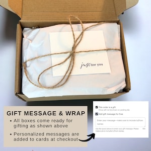 May include: A gift box with a white tissue-wrapped item, tied with twine and a small card that reads "just for you." The box is open, showing the contents ready for gifting. Text on the image says "Gift Message & Wrap."