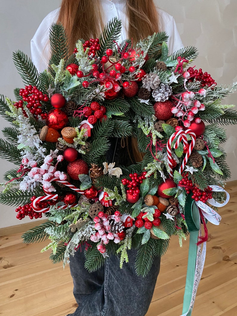 Red christmas wreath for front door with pinecones, red berries and pine. image 2