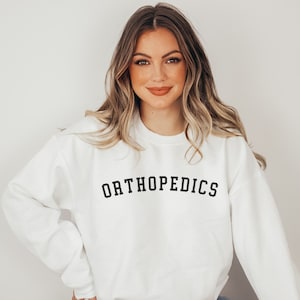Orthopedics Crewneck Sweatshirt, Orthopedic Doctor Sweater, Ortho Nurse, Orthopedic Gift, Graduation Gift, Orthopedic Surgery
