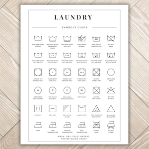 May include: A black and white laundry care symbols guide with text that reads "Laundry Symbols Guide" and "Wash. Dry. Fold. Repeat. You're doing great."