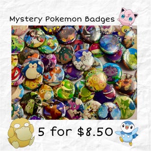 May include: A selection of colourful, round "Mystery Pokemon Badges" featuring various Pokemon characters. The badges have a glossy finish and are arranged in a pile. The image includes the text "Mystery Pokemon Badges".
