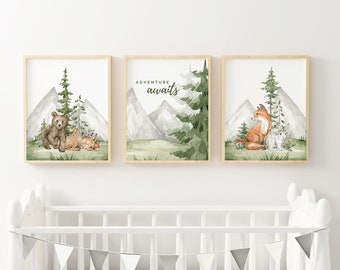 May include: Three watercolor prints featuring a bear and fox with their young in a forest setting. The middle print has the text "Adventure awaits" in a handwritten font.