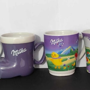 Milka collectible cups. Milka Christmas edition and Easter edition cups. Vintage hot chocolate, milk or coffee mugs. Vintage collectibles.