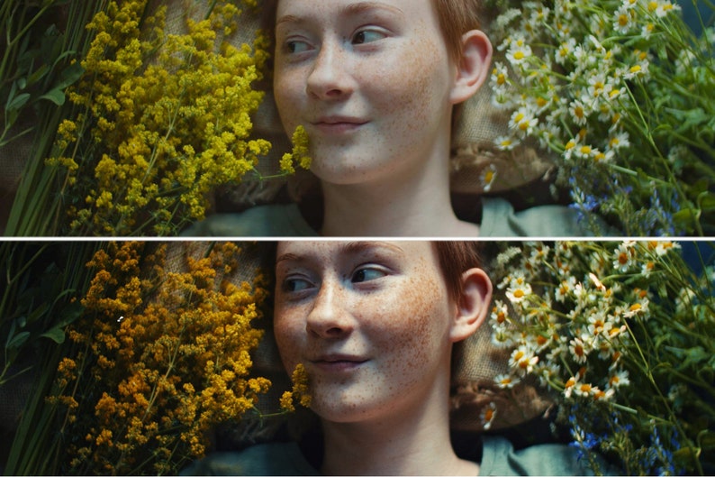 May include: A close-up of a young person with freckles lying on a bed of yellow and white flowers. The person is smiling and looking to the right. The flowers are in focus, while the person's face is slightly out of focus.