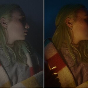 May include: A person with green hair is wrapped in a colourful striped blanket. The person is looking to the right and has a serious expression on their face.