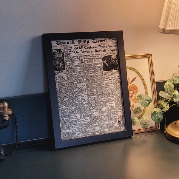 Framed poster of the page of the Roswell Daily Record from July 8, 1947, flying saucer crash, vintage poster historical archive UFO document