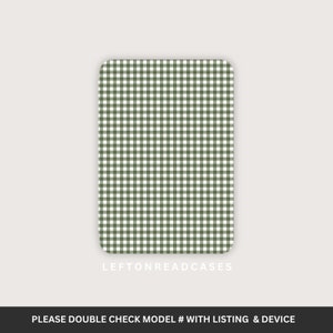 May include: A rectangular case with rounded corners, featuring a green and white gingham pattern. The text "LEFTONREADCASES" is printed in white at the bottom. The text "PLEASE DOUBLE CHECK MODEL # WITH LISTING & DEVICE" is printed at the bottom.