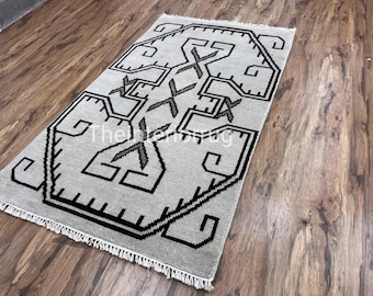 Handvävd ullmatta i tribalstil, neutral geometrisk boho-accent