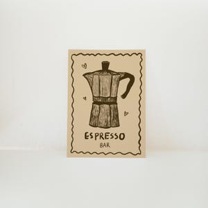 Machine à expresso de type carte postale