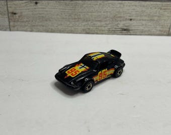 Coche de juguete Hot Wheels clásico Porsche 911 de 1974, fabricado en Hong Kong.