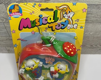 Vintage Tin Apple Rabbit Music Box: Kong Pull Cord Toy