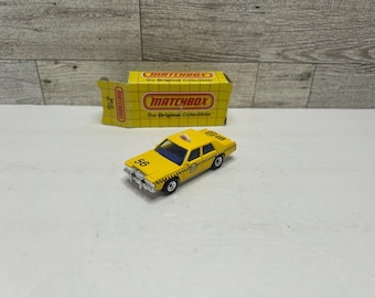 Taxi Ford LTD de Matchbox de 1987, juguete de metal fundido • Incluye caja original