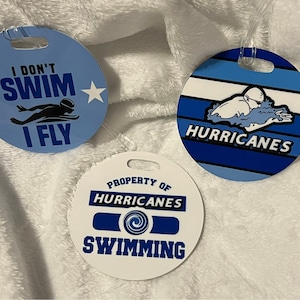 Swim team/ Breaststroke/ Butterfly/ Property of Sports bag tag/ Bogg bag tag