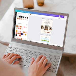 May include: A person using a laptop to design a wedding invitation. The screen shows a template with photos, text, and color palettes. The text on the screen reads "Wedding Weekend Schedule".