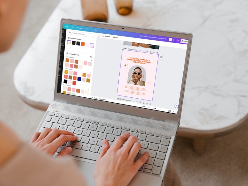May include: A person using a laptop to design a social media post. The post features a woman wearing sunglasses and a pink background with the text "Welcome to Olivia's Bachelorette Weekend Celebration!"