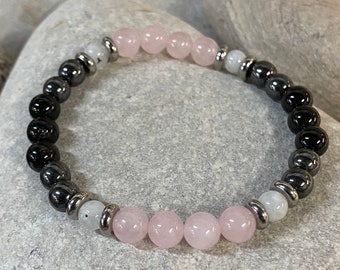 Pulsera de cuarzo rosa con piedra lunar: hematita, turmalina y plata de ley
