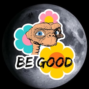 May include: A black and white illustration of E.T. the Extra-Terrestrial with a friendly expression, surrounded by colorful flowers. The text "BE GOOD" is written in black on a white background.
