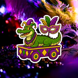 May include: A cartoon sticker featuring a green alligator wearing a purple and gold jester hat and a beaded necklace. The alligator is on a purple cart with yellow wheels, and a purple mask with feathers is next to it. The background is a blur of purple and gold.