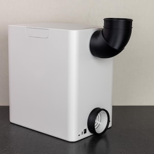 May include: A white rectangular humidifier with a black exhaust pipe and a black vent on the bottom.