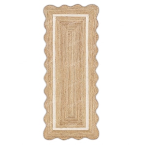 May include: A natural fiber rug with a white border and a scalloped edge. The rug is made of jute and has a rectangular shape.