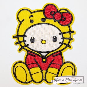 May include: A set of three ceramic mugs with a speckled, matte finish in cream, light grey, and dark grey. Each mug has a simple, minimalist design and a rounded handle.