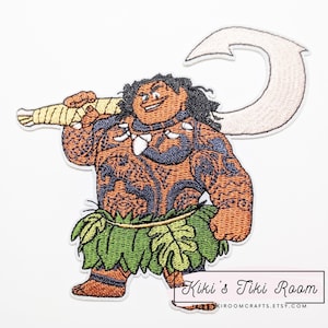 May include: Embroidered patch featuring a cartoon character with brown skin, tattoos, and a green leaf skirt. The character holds a large, curved hook and a wrapped staff. The patch has a white border and the text "Kiki's Tiki Room".