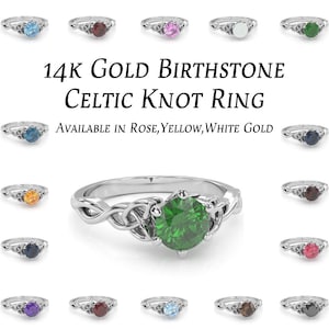 Puede incluir: Anillo de nudo celta de oro de 14 quilates con piedra de nacimiento, disponible en oro rosa, amarillo o blanco. El anillo presenta un diseño de nudo celta con una variedad de opciones de piedras de nacimiento.