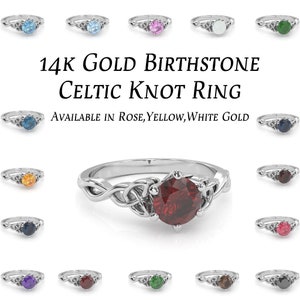 May include: A 14k gold Celtic knot ring with a red gemstone. The ring is available in rose, yellow, and white gold.