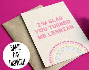 May include: A card with a rainbow made of hearts and the text "I'm glad you turned me lesbian".