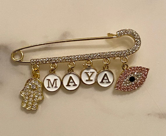 Jewish Charms Gold Baby Safety Pin in 14K Gold | Izakov Fine  Jewish stroller evil eye protection pin display picture 1