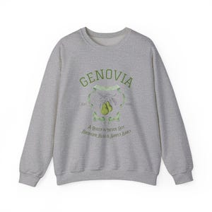May include: A gray sweatshirt with a green print that says "GENOVIA est. 2008" with a pear design and the text "A Queen is never late, everyone else is simply early."