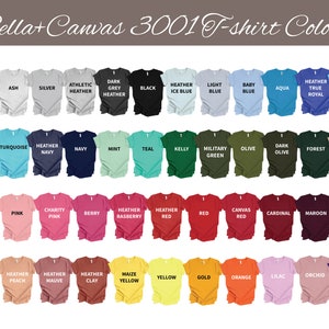 May include: A display of Bella+Canvas 3001 T-shirts in various colors, including white, black, and shades of blue, green, pink, and yellow. The image showcases a wide range of options for apparel design, with each color labeled for easy selection.