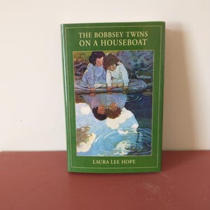 The Bobbsey Twins on a Houseboat by Laura Lee Hope (2004 Hardcover with Dust Jacket)