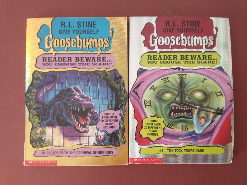 May include: Two Goosebumps books by R.L. Stine, "Escape from the Carnival of Horrors" and "Tick Tock, You're Dead!"  Both books feature a scary monster on the cover and the text "Reader Beware... You Choose the Scare!"