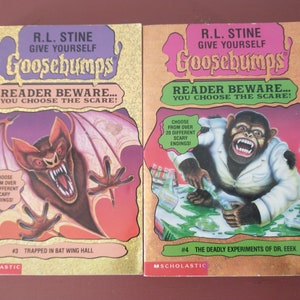 May include: Two Goosebumps books with a yellow background and a purple and pink border. The book on the left features a bat with red eyes and a scary expression. The book on the right features a monkey wearing a white lab coat and holding a test tube. Both books have the text "Reader Beware... You Choose the Scare!" and "Choose from over 20 different scary endings!" The book on the left is titled "Trapped in Bat Wing Hall" and the book on the right is titled "The Deadly Experiments of Dr. EEEK".