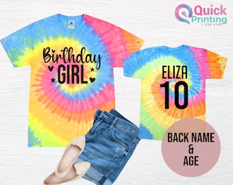May include: Two tie-dye t-shirts, one with the text "Birthday Girl" and the other with the text "Eliza 10".